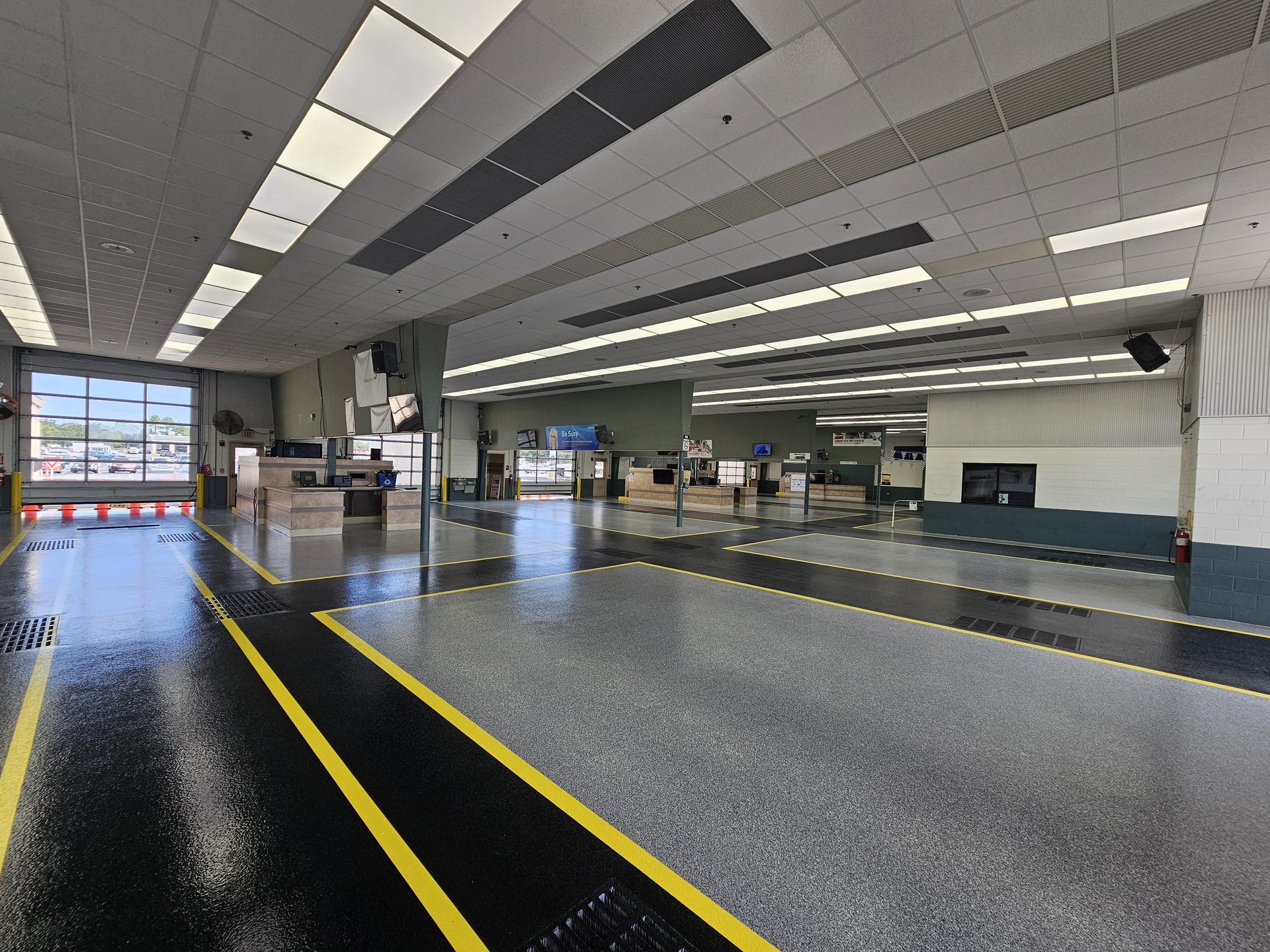 Automotive service center with striped epoxy floor