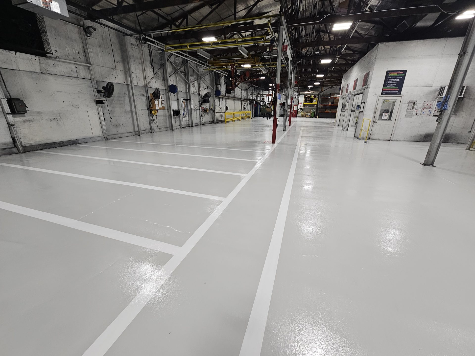 Commercial warehouse floor with safety striping