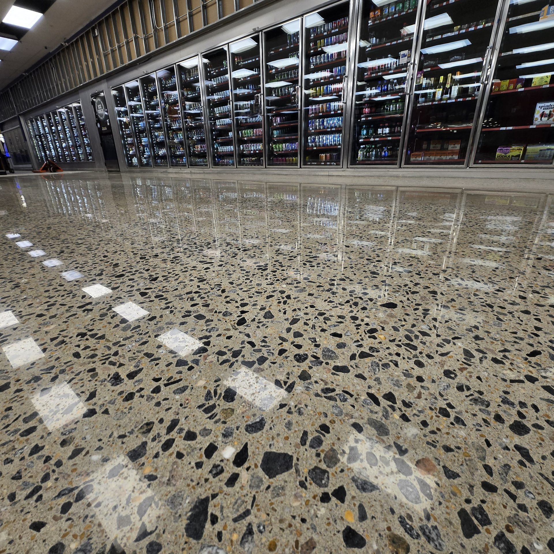Liquor store polished aggregate concrete