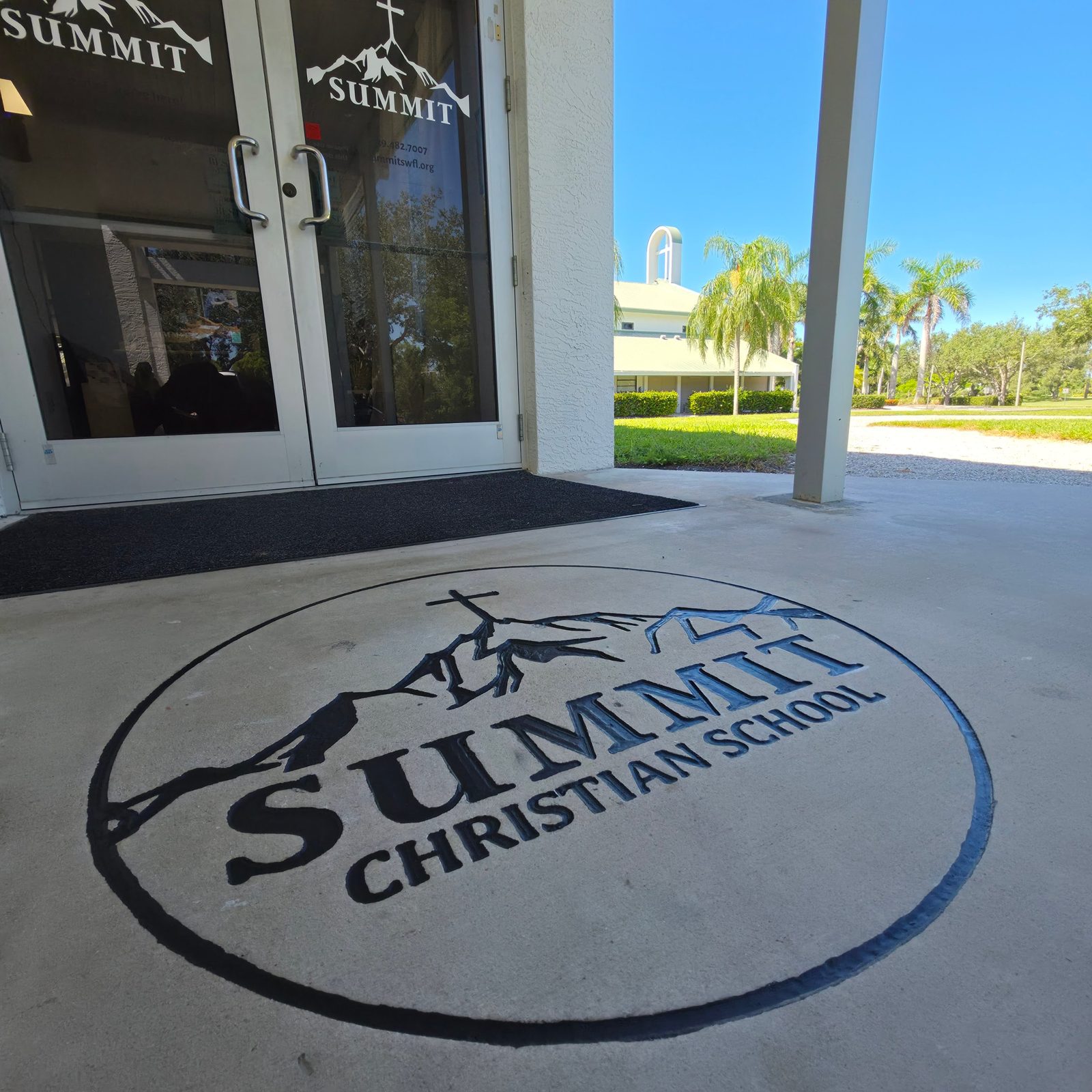 Summit Christian School logo engraved into the concrete entry